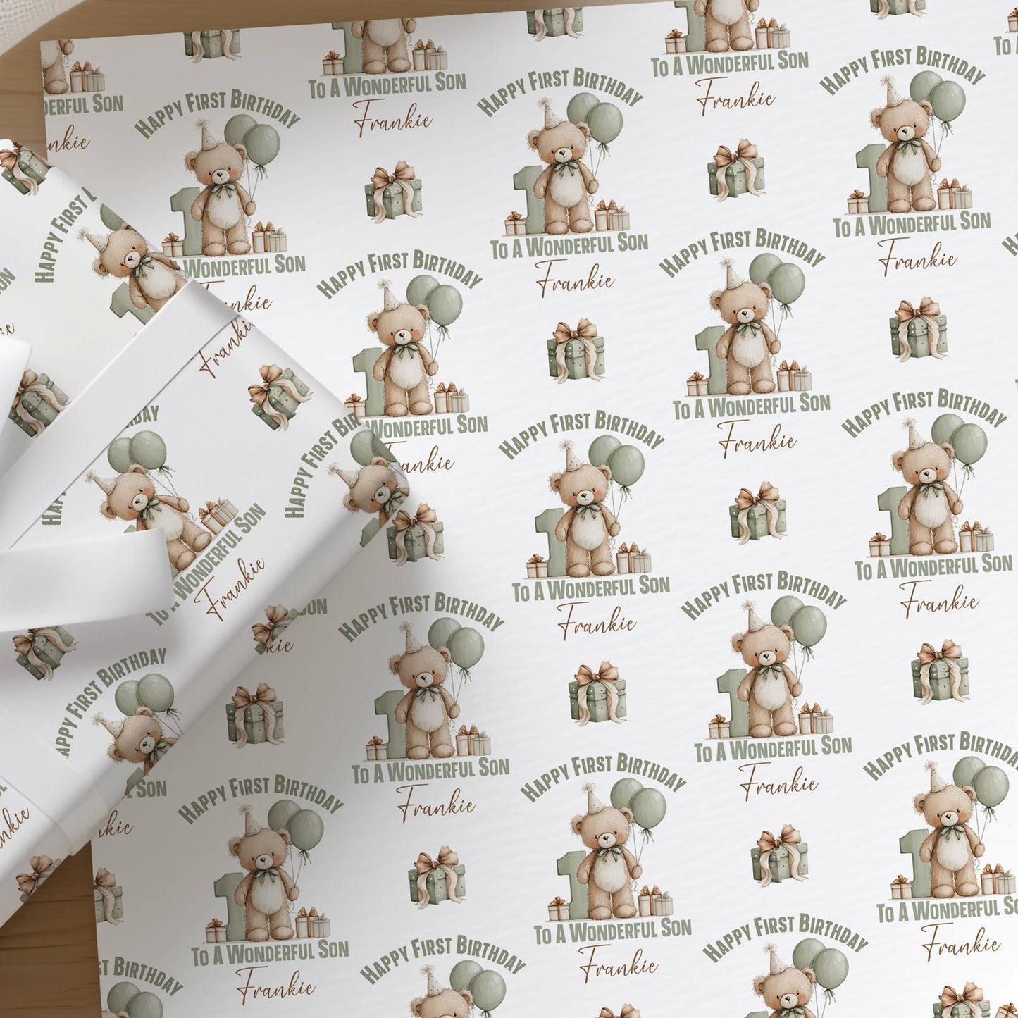 Personalised teddy bear wrapping paper printed with a custom name, shown as a full sheet