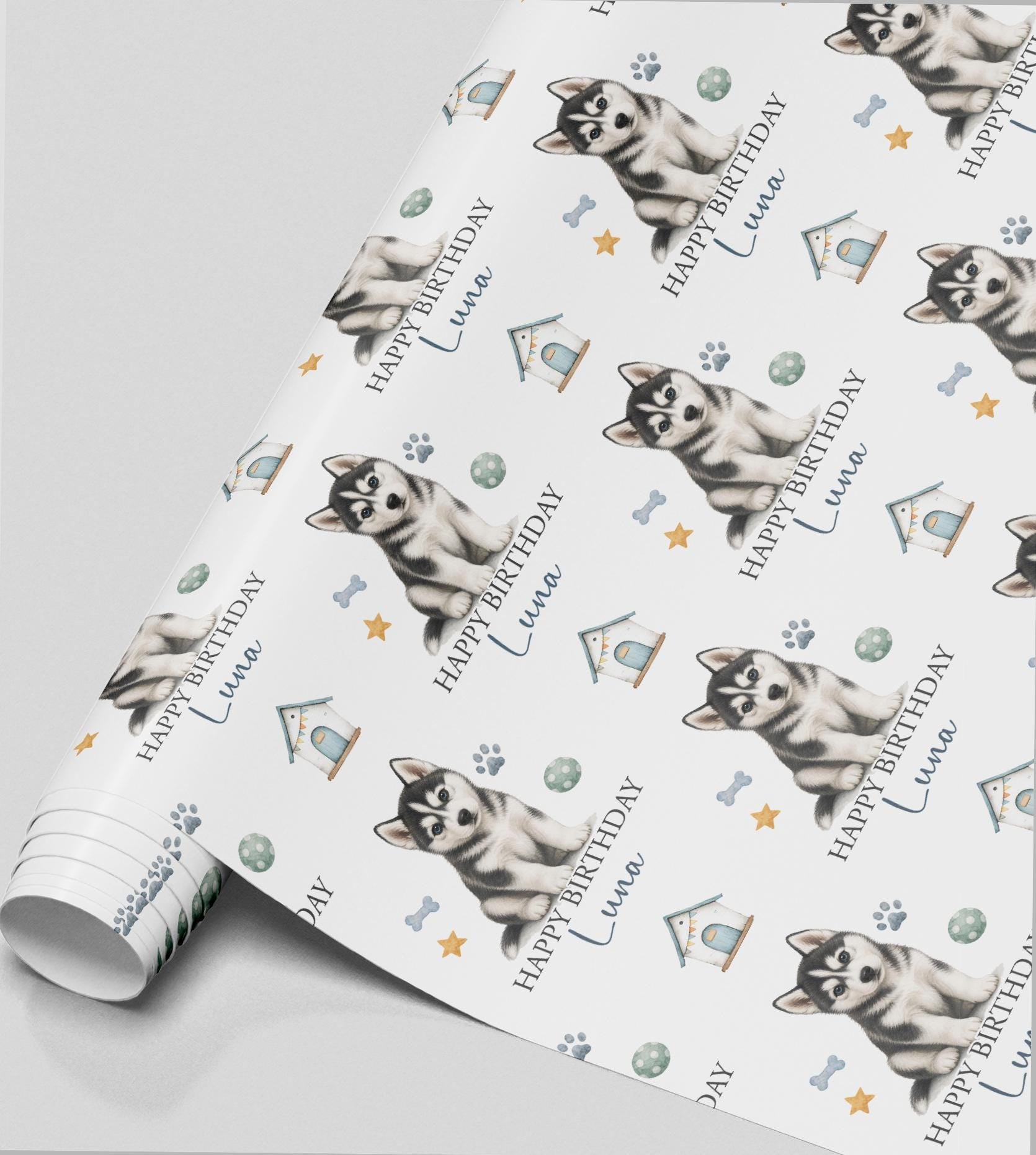 Personalised Husky birthday wrapping paper featuring a cute Siberian Husky puppy, custom name, paw prints and dog toys.
