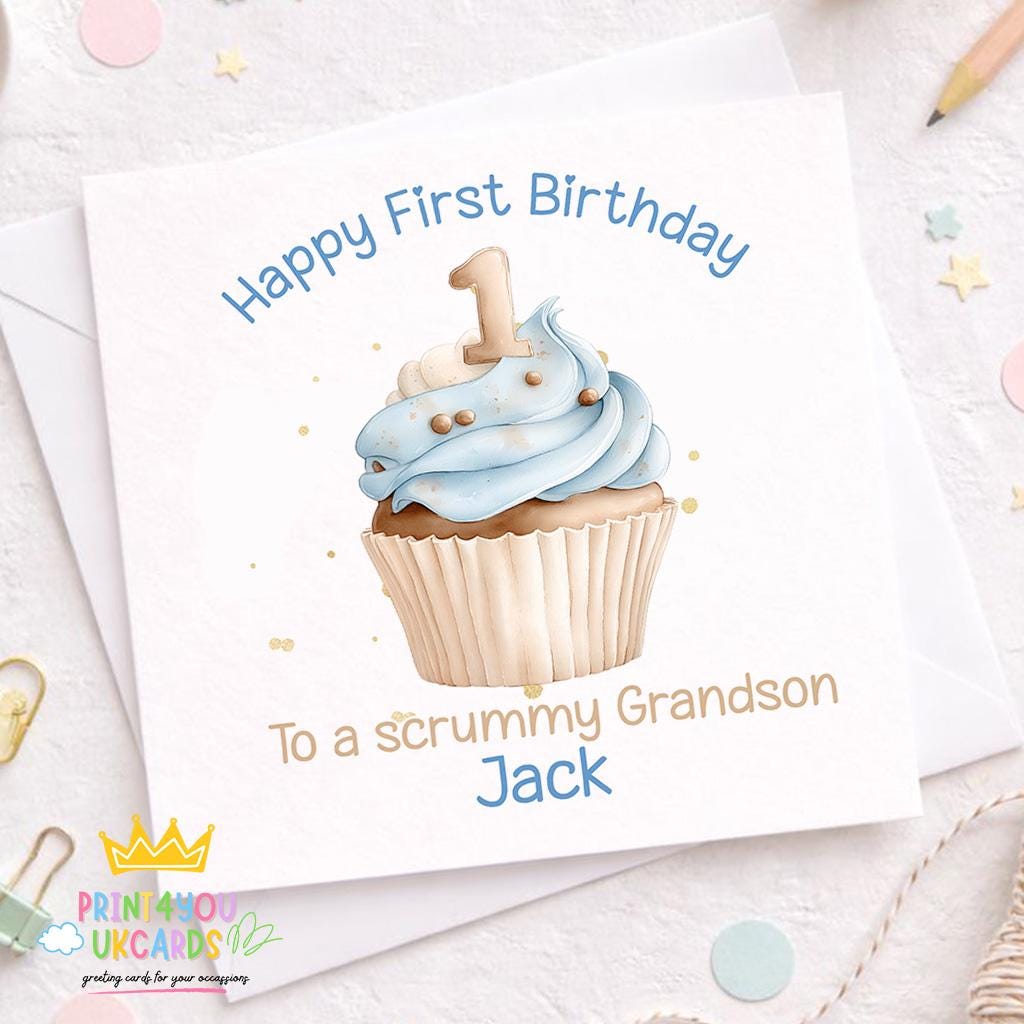 Front view of the blue cupcake 1st birthday keepsake card on a plain background, showing the square card format.