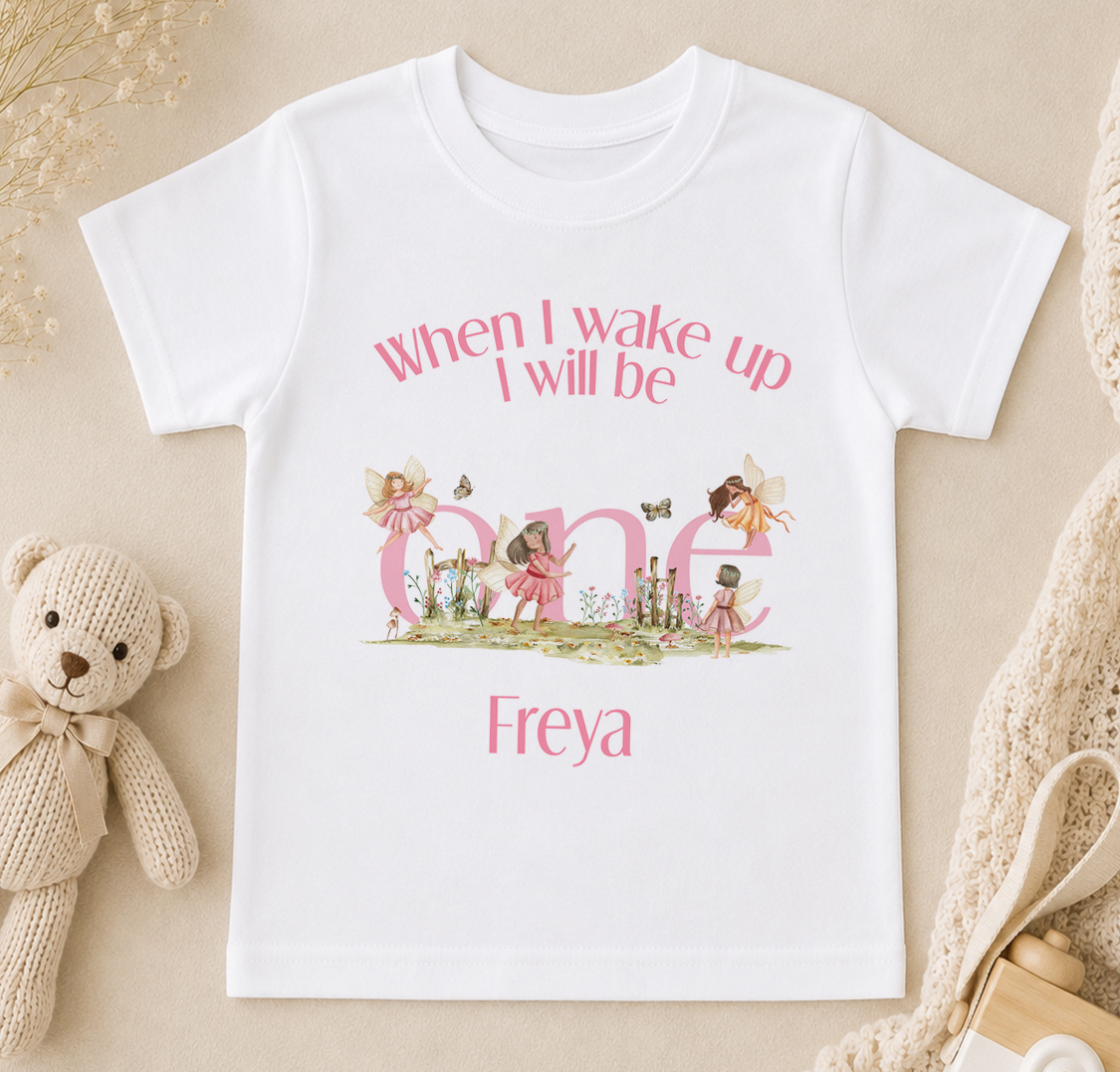 White T-shirt printed with fairy illustrations and the personalised name 'Freya'
