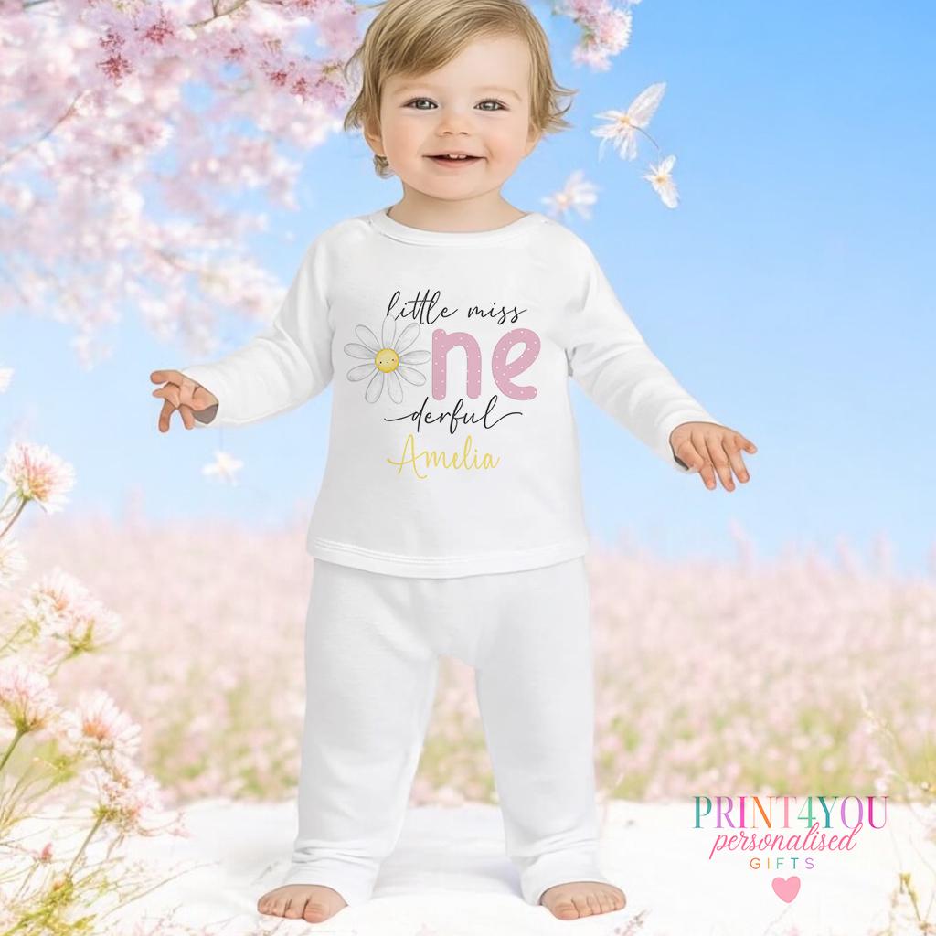 Personalised Little Miss One-derful daisy long sleeved vest, custom printed with baby girl's name for her first birthday.