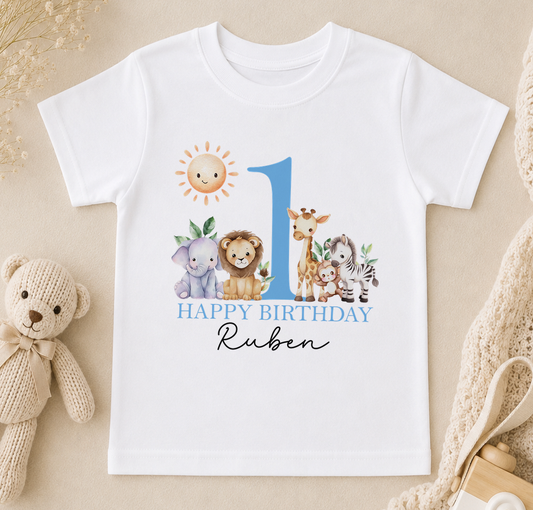A white t-shirt with a graphic design featuring a sun, animals, and the text "Happy Birthday Ruben" printed on it.