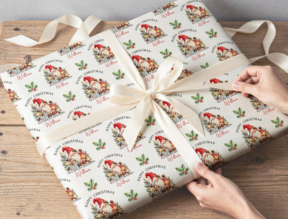 Sheets of the personalised gnome Christmas wrapping paper