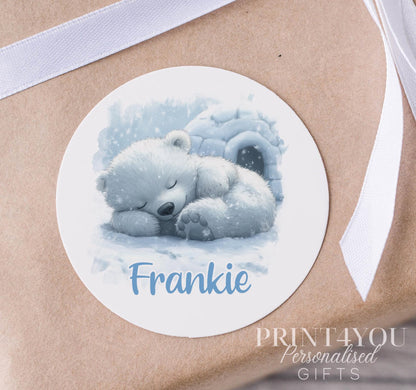 Personalised polar bear Christmas sticker on a strip – glossy white 5cm round gift and party bag label printed with a custom name