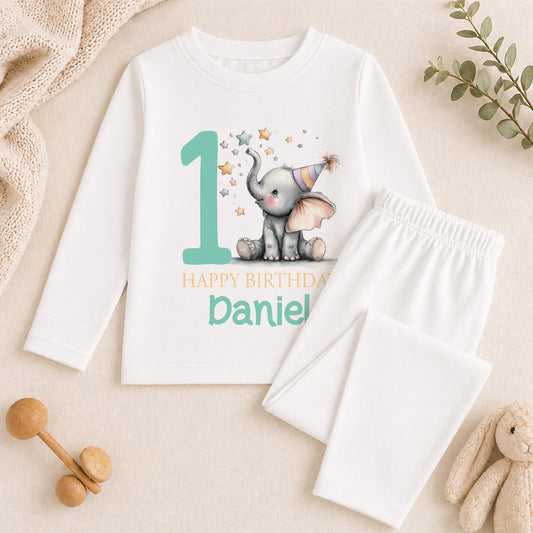 Personalised first birthday pyjamas with elephant design and custom name, soft cotton
