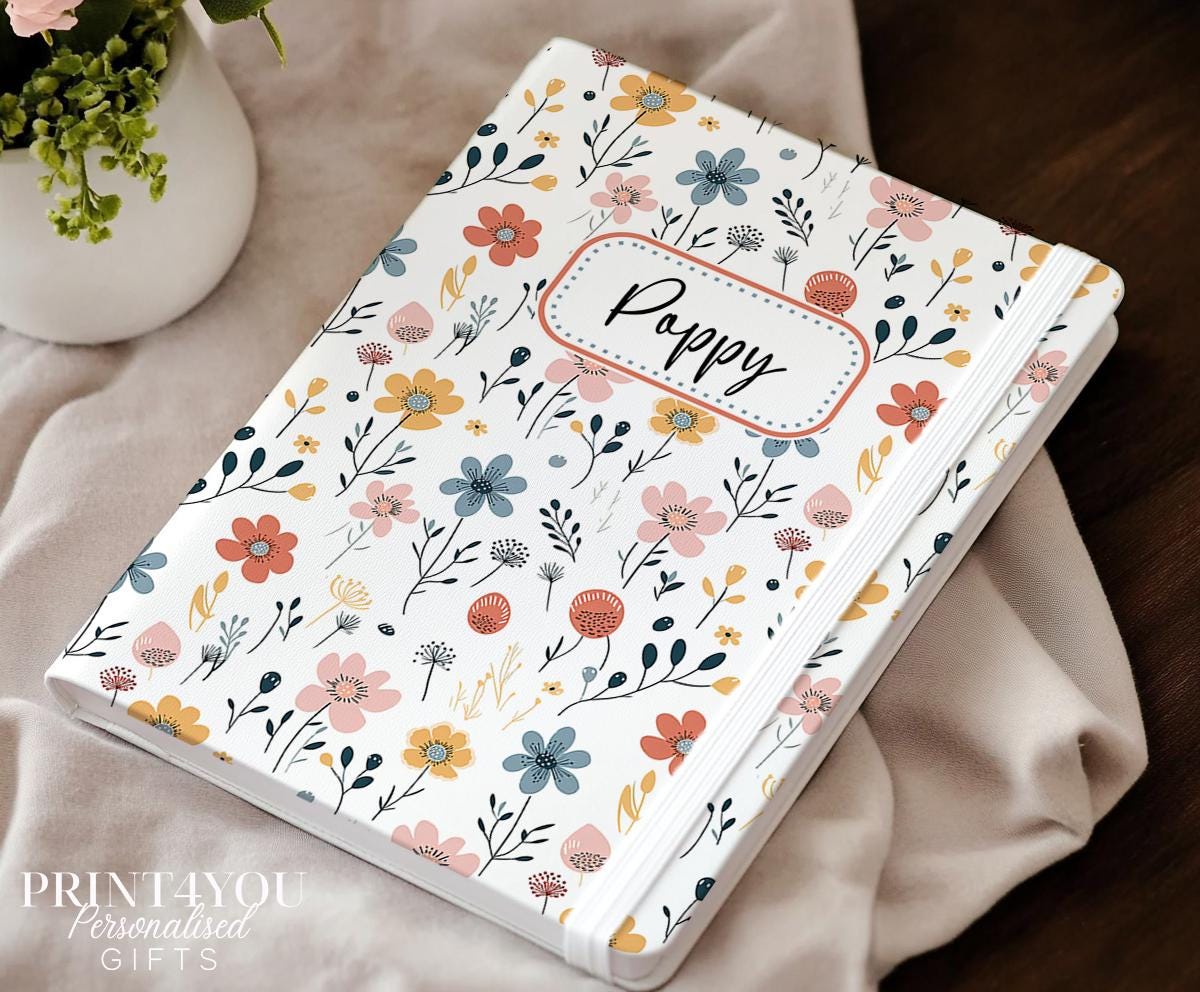 Personalised A5 floral notebook with wildflower design and custom name on cream PU leather cover