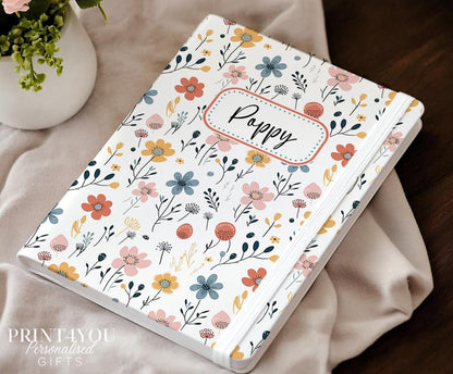 Personalised A5 floral notebook with wildflower design and custom name on cream PU leather cover