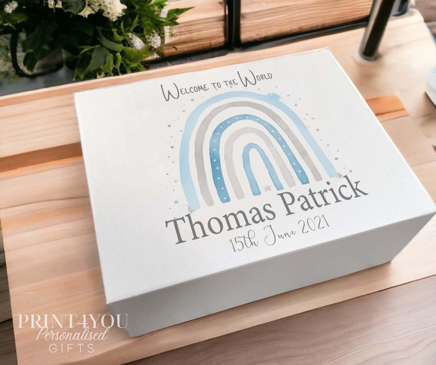 White personalised keepsake box with blue new baby boy welcome design and magnetic closure