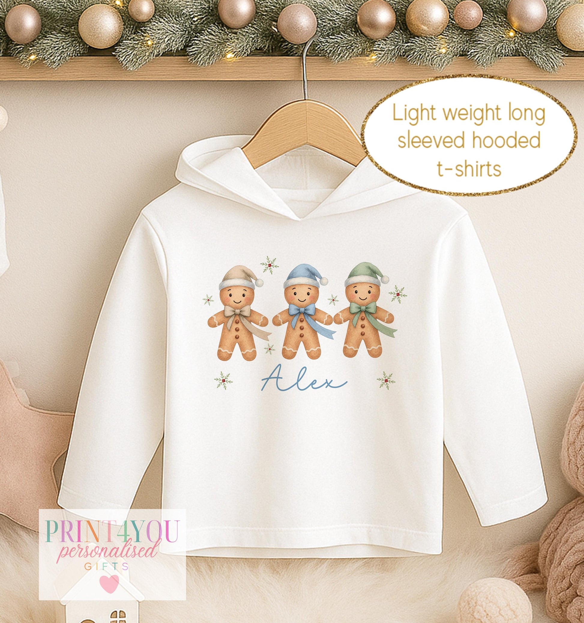 Personalised Christmas hooded t-shirt for boys, white long sleeved hoodie printed with three gingerbread men in blue bobble hats and a name