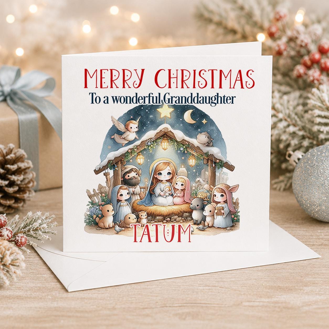 Personalised nativity Christmas card, white 6x6 inch square card printed with an arched nativity scene and a bright star with a name