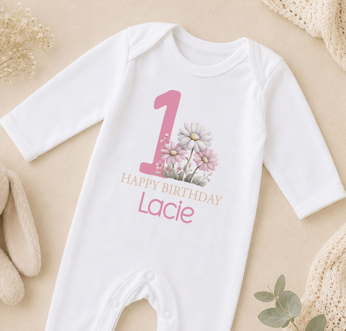 Personalised white babygrow with pink floral number one design and 'Happy Birthday' name print
