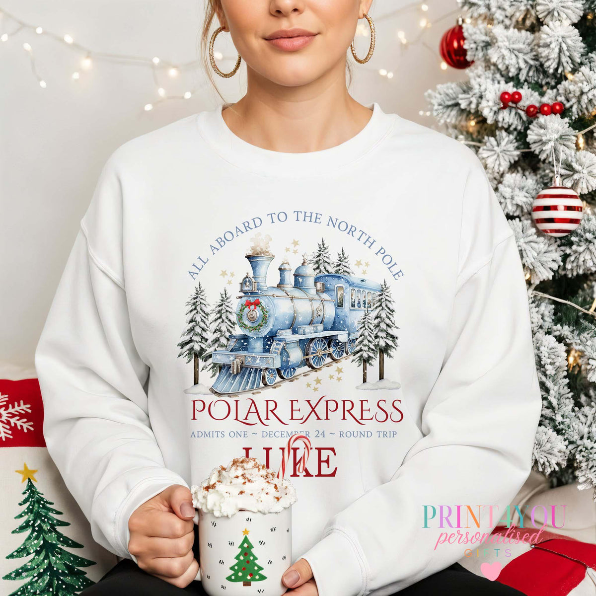 Unisex Christmas jumper with blue Polar Express steam train, snowy pines and stars design, size X Small