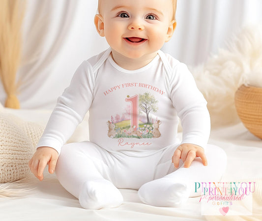 Personalised Bunny Rabbit first birthday t-shirt with baby's name and age printed on the front.