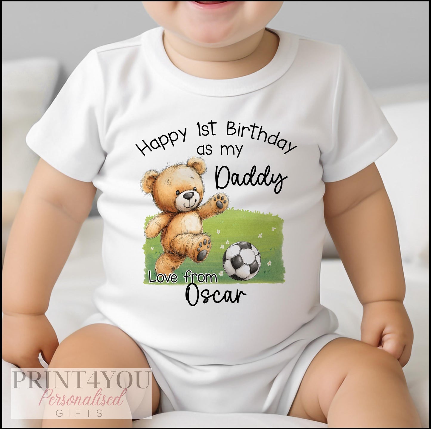 Close-up of the teddy bear football design on a personalised first birthday vest for Daddy