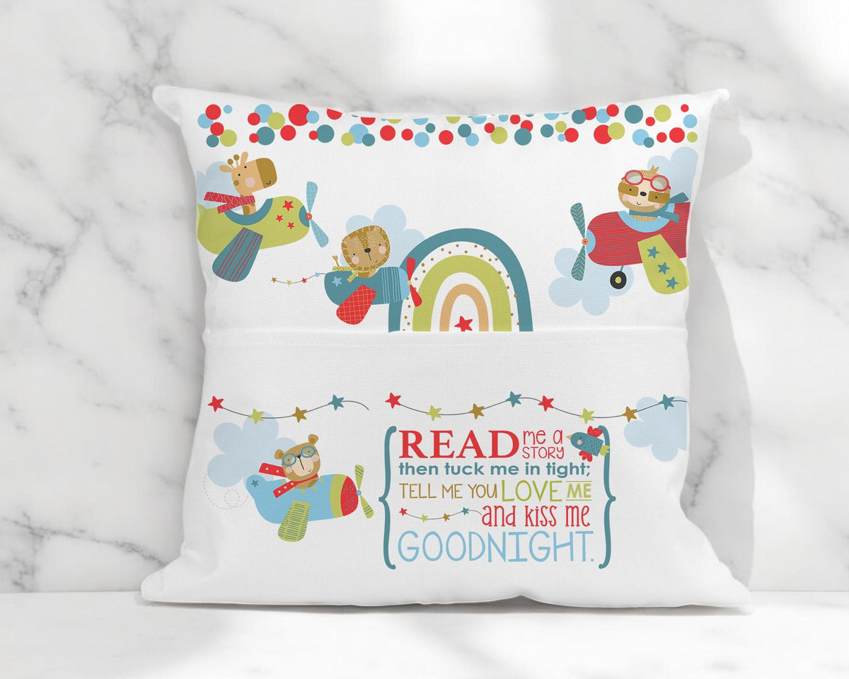 Airplane themed book cushion styled on a child's bed in a bedroom setting