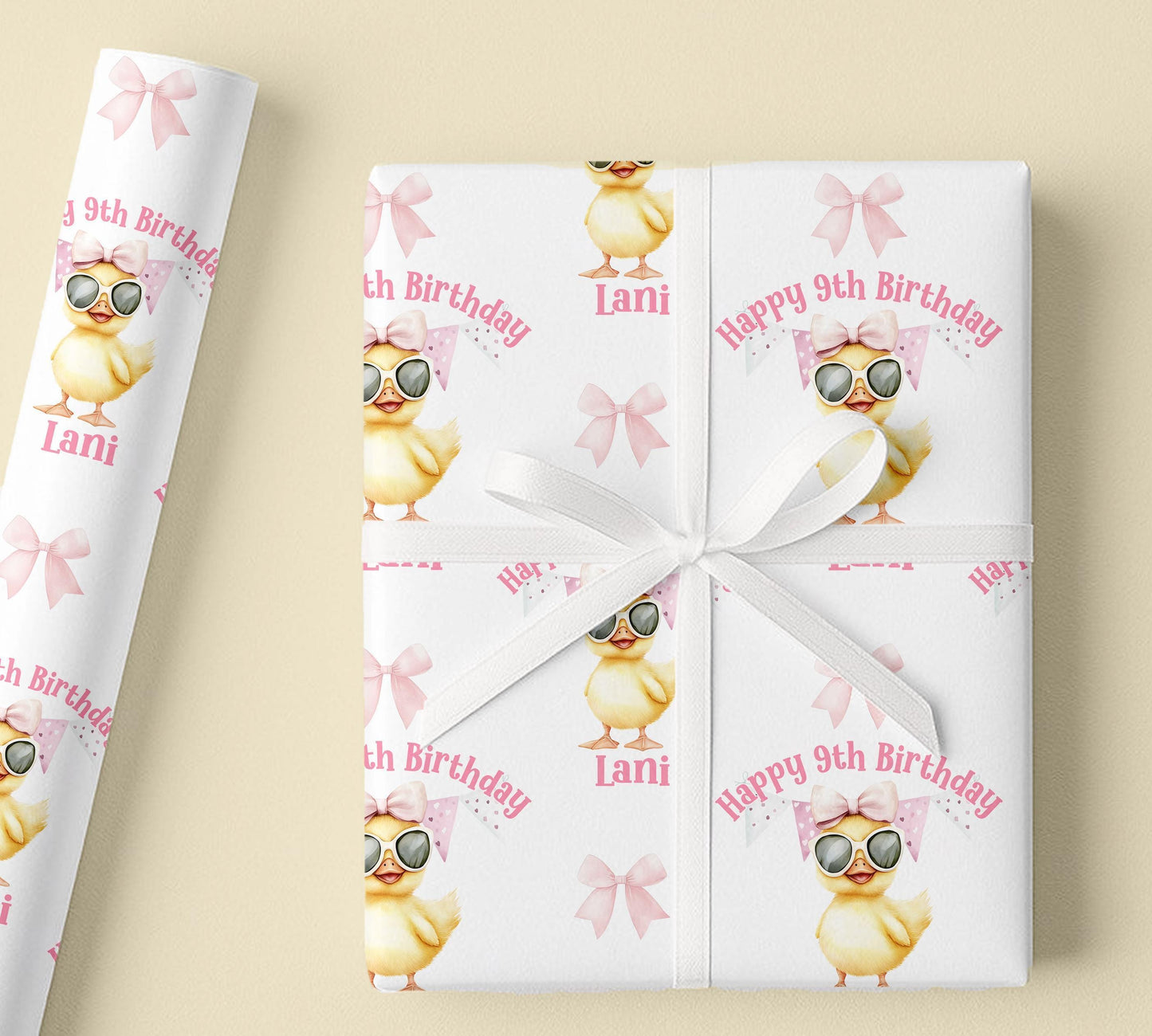 A wrapped gift box finished with ribbon, wrapped in the personalised sunglasses duck wrapping paper