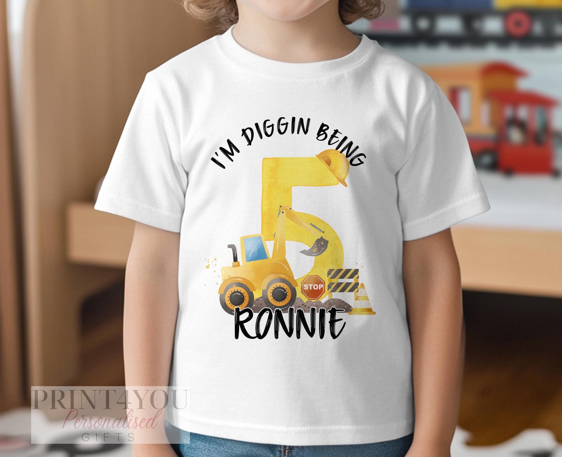Personalised construction digger birthday t-shirt, back view on white cotton