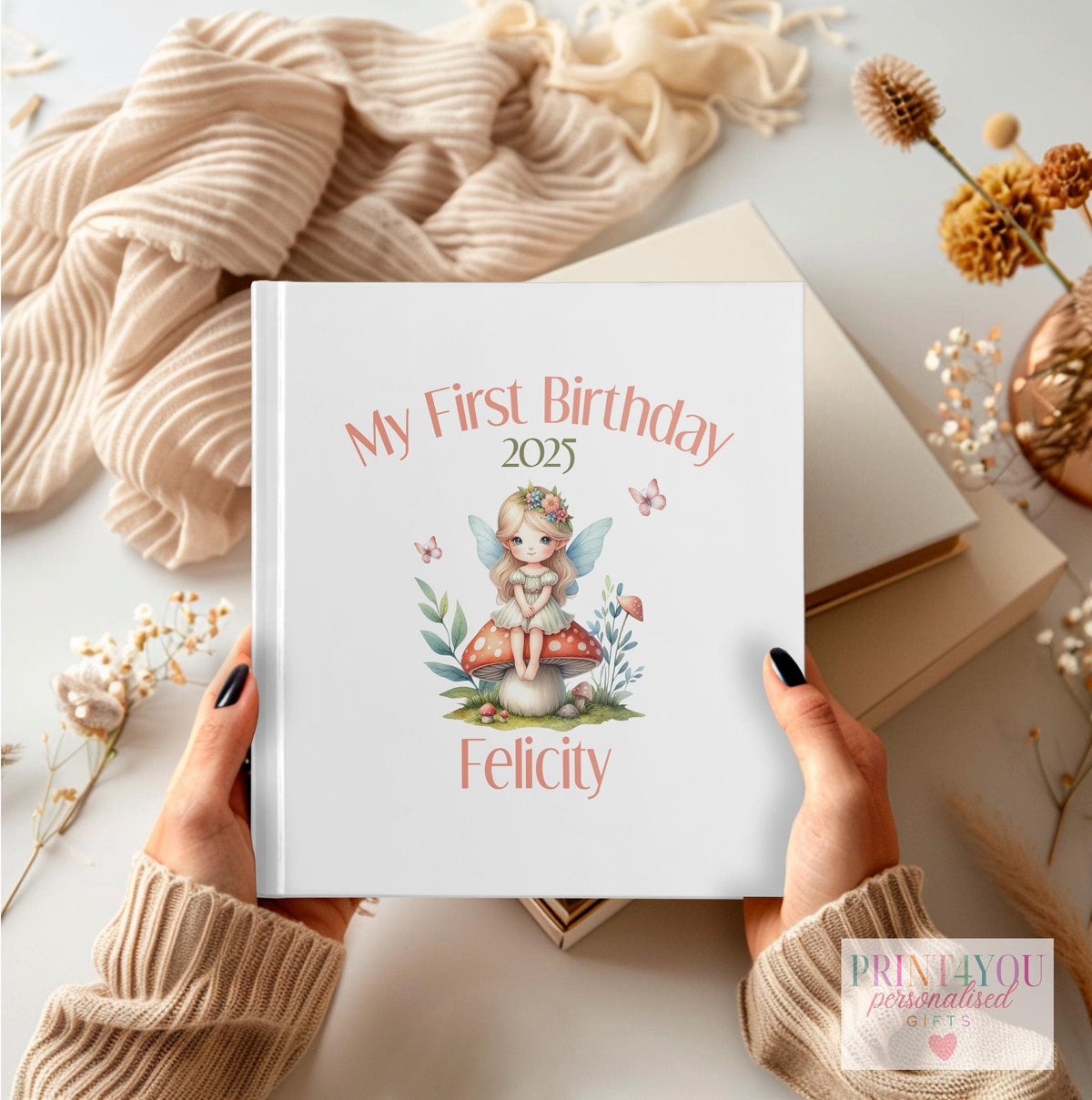Personalised first birthday photo album with My First Fairy Birthday design and custom name on the cover