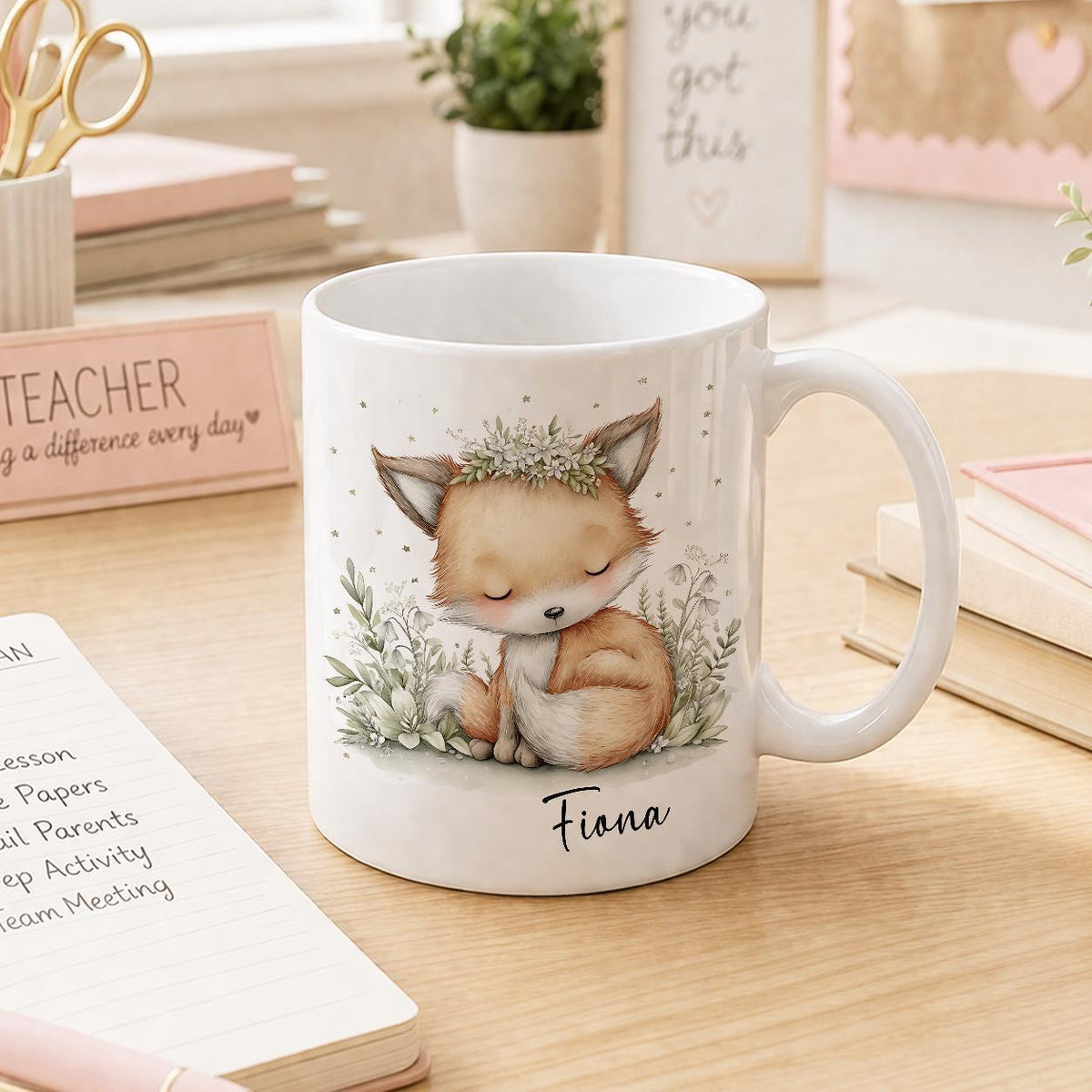 White ceramic mug printed with a woodland fox design, personalised with a name