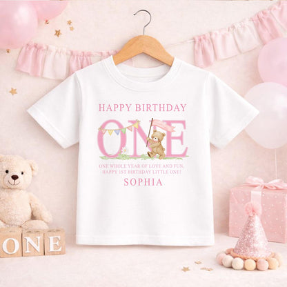 Soft cotton first birthday outfit in pink stripes, personalised with a chosen name.