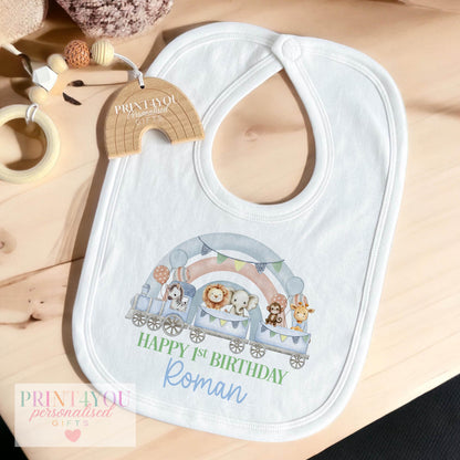 Personalised safari train rainbow sleepsuit printed with the child's custom name and the train design.