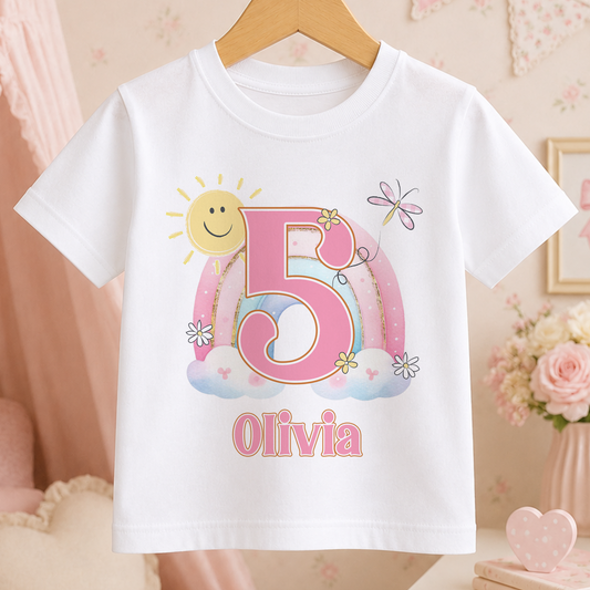 A white t-shirt with a pink number 5 and a sun design, along with the name 'Olivia' printed on it.