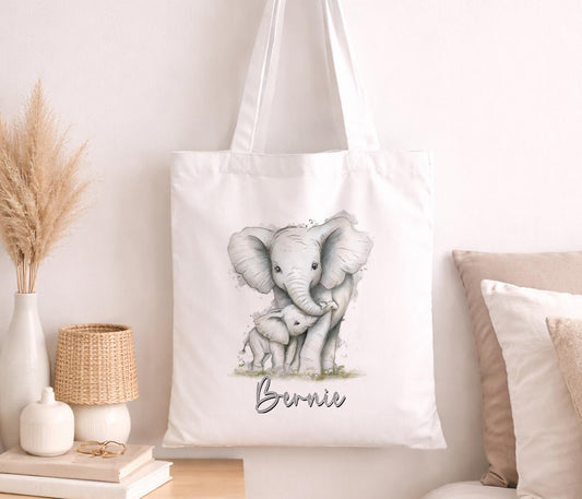 Cotton tote bag printed with a soft grey elephant illustration and a personalised custom name