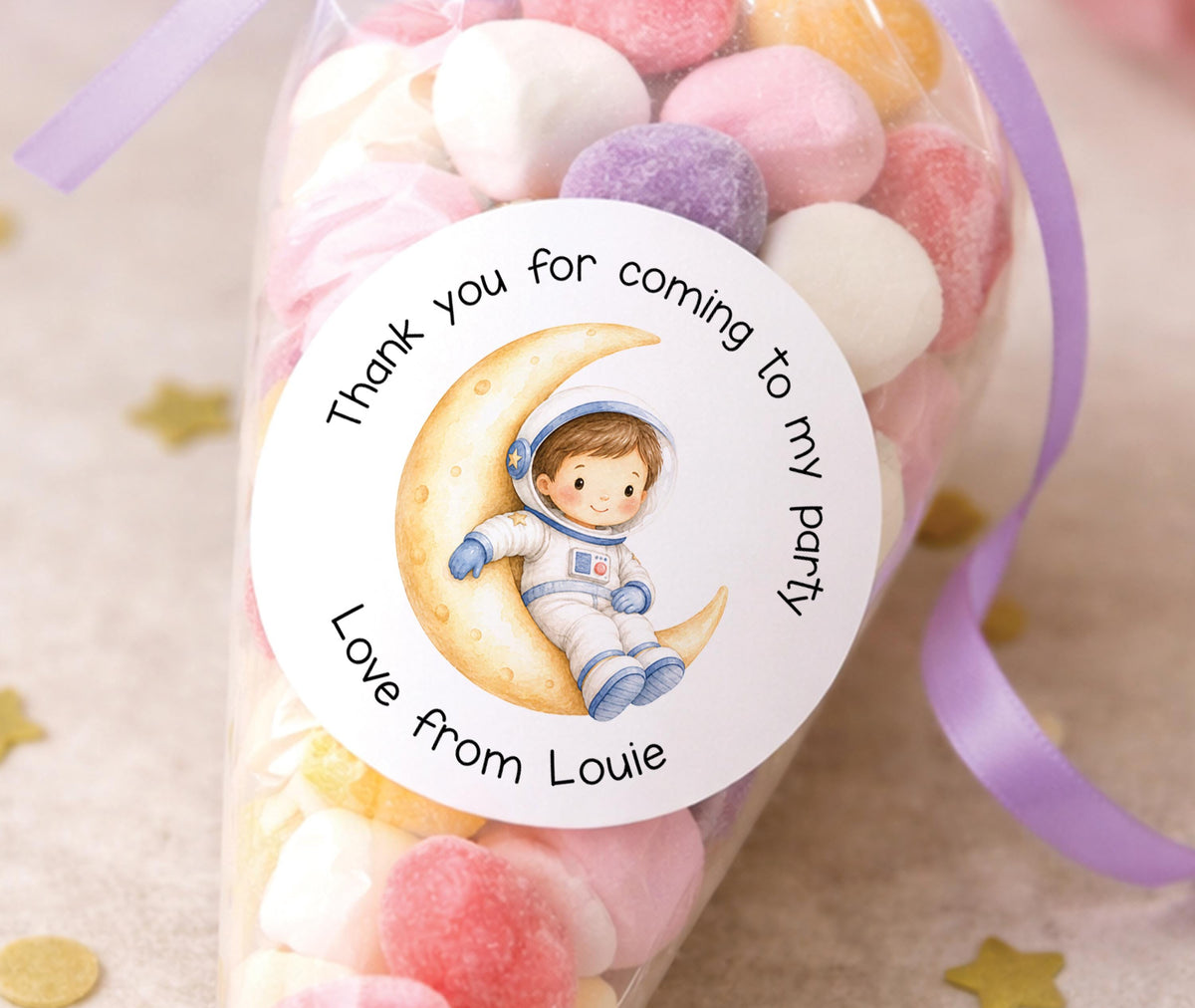 Sheet of glossy round stickers featuring an astronaut birthday design, personalised with a child's name