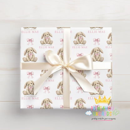 Personalised bunny teddy wrapping paper rolled and shown with a tape measure to indicate width.