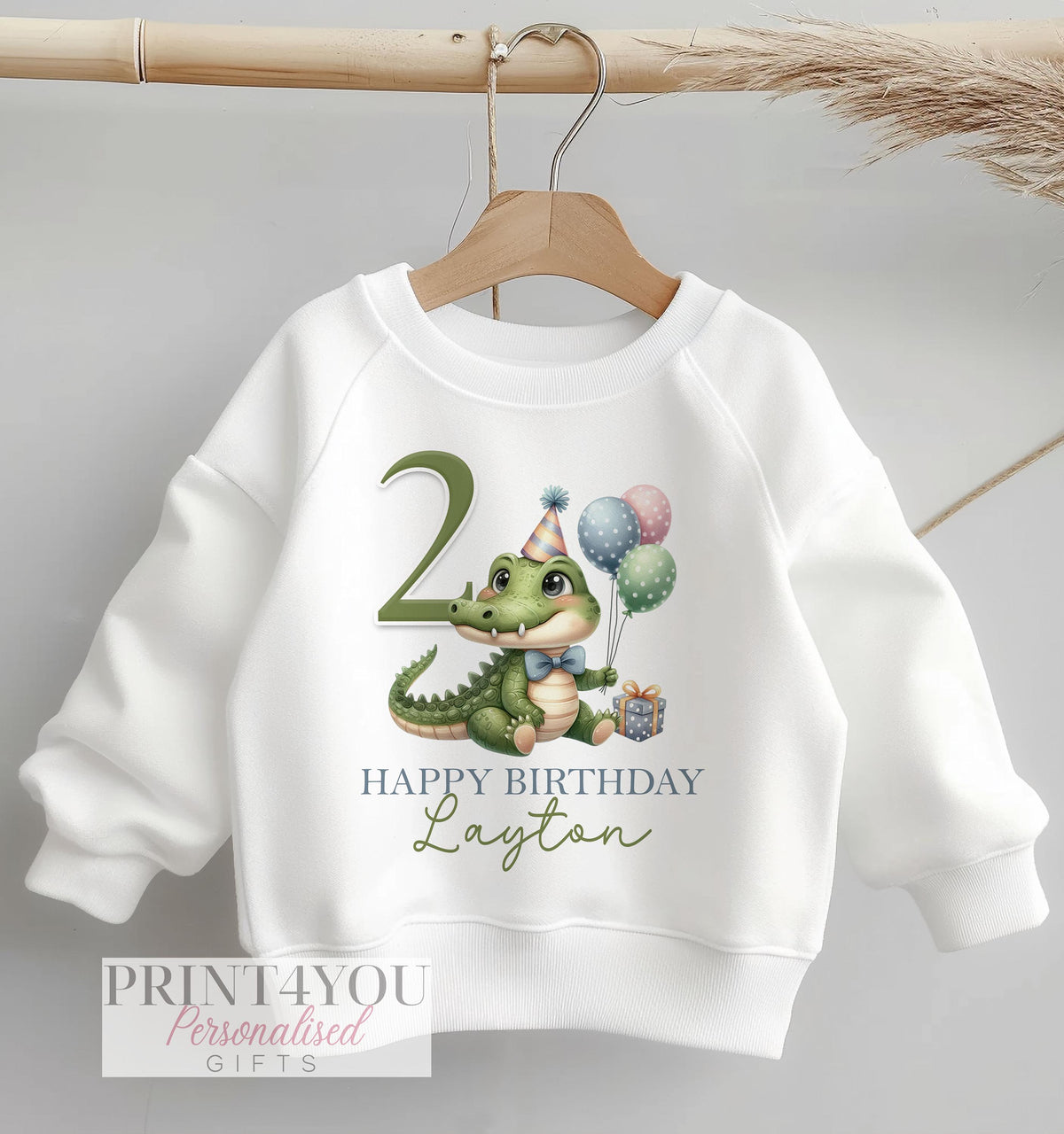 Personalised white cotton sweatshirt for children with crocodile design, customised with name and birthday age
