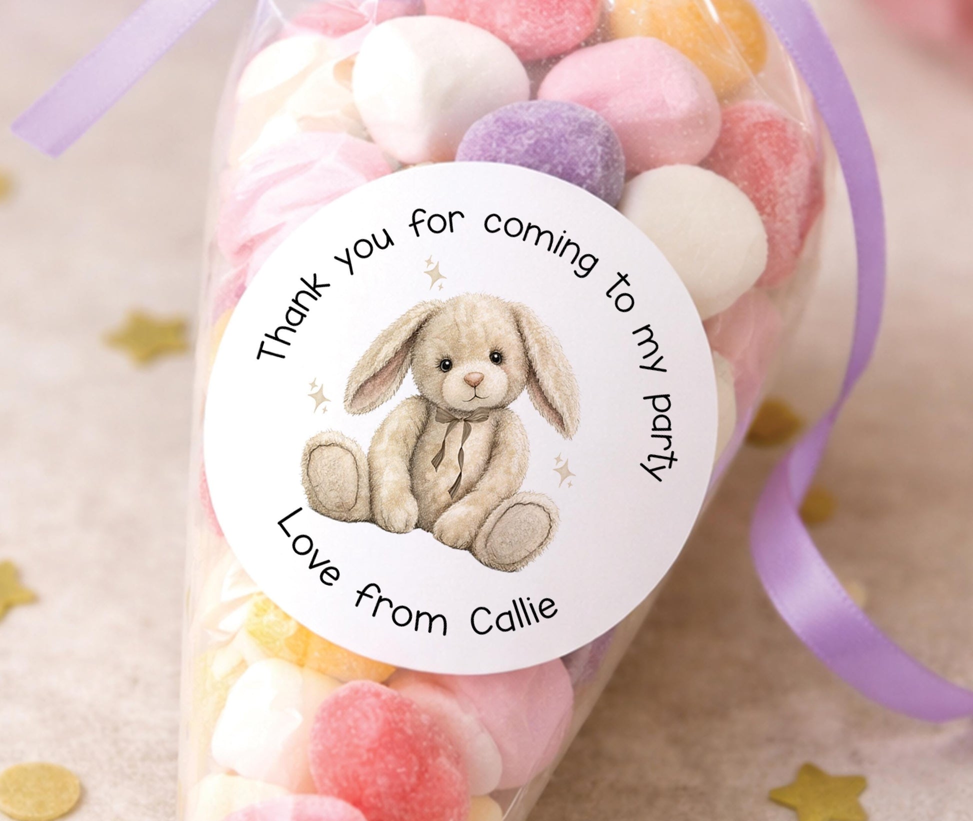 Round glossy stickers featuring a soft neutral bunny design, personalised for baby shower favours