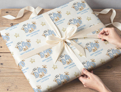 Personalised Father's Day wrapping paper wrapped around a gift box