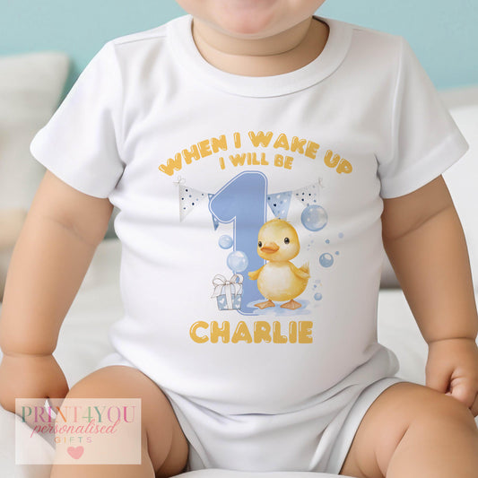 Personalised fluffy duck first birthday bib, printed on soft cotton with space for your baby's name.
