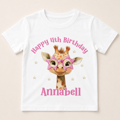 White cotton birthday t-shirt printed with a cartoon giraffe wearing pink star-shaped glasses, personalised with a custom name and age birthday message