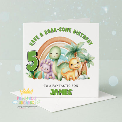 Front view of the personalised rainbow dinosaur birthday card printed on 350gsm card stock.