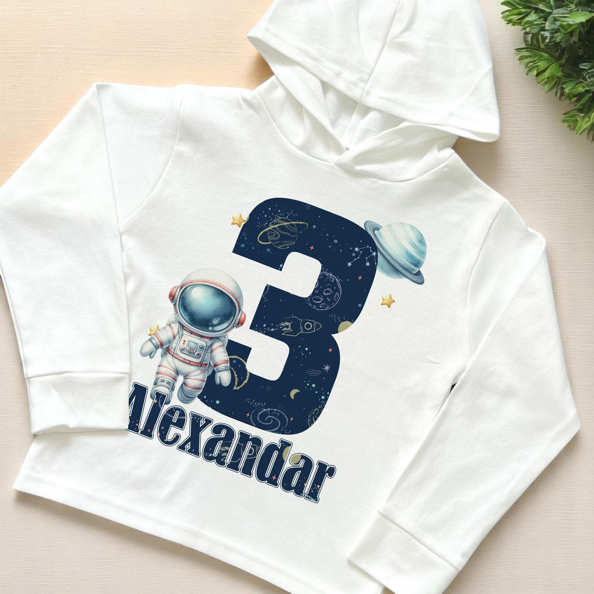 White personalised space astronaut birthday hooded long-sleeve top, lightweight cotton jersey, size 6-12 months