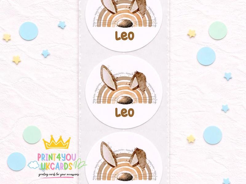 Sheet of round glossy bunny birthday stickers printed with a child's name, boho pastel design