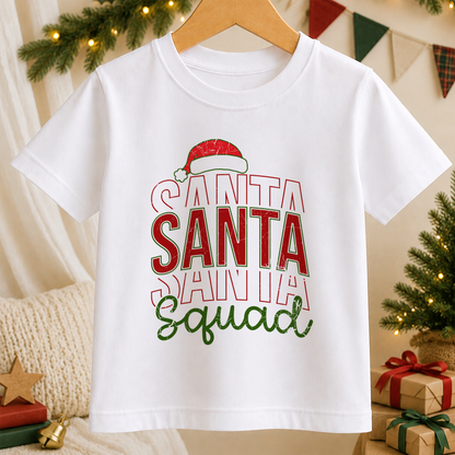 A white t-shirt with the text "SANTA SQUAD" printed on it, along with a Santa hat icon.