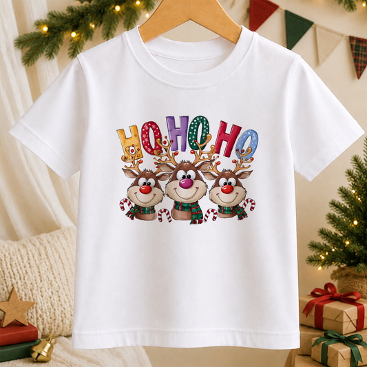 A white t-shirt with a colorful graphic design featuring three cartoon reindeer with antlers and the word "HOHOHO" written above them.