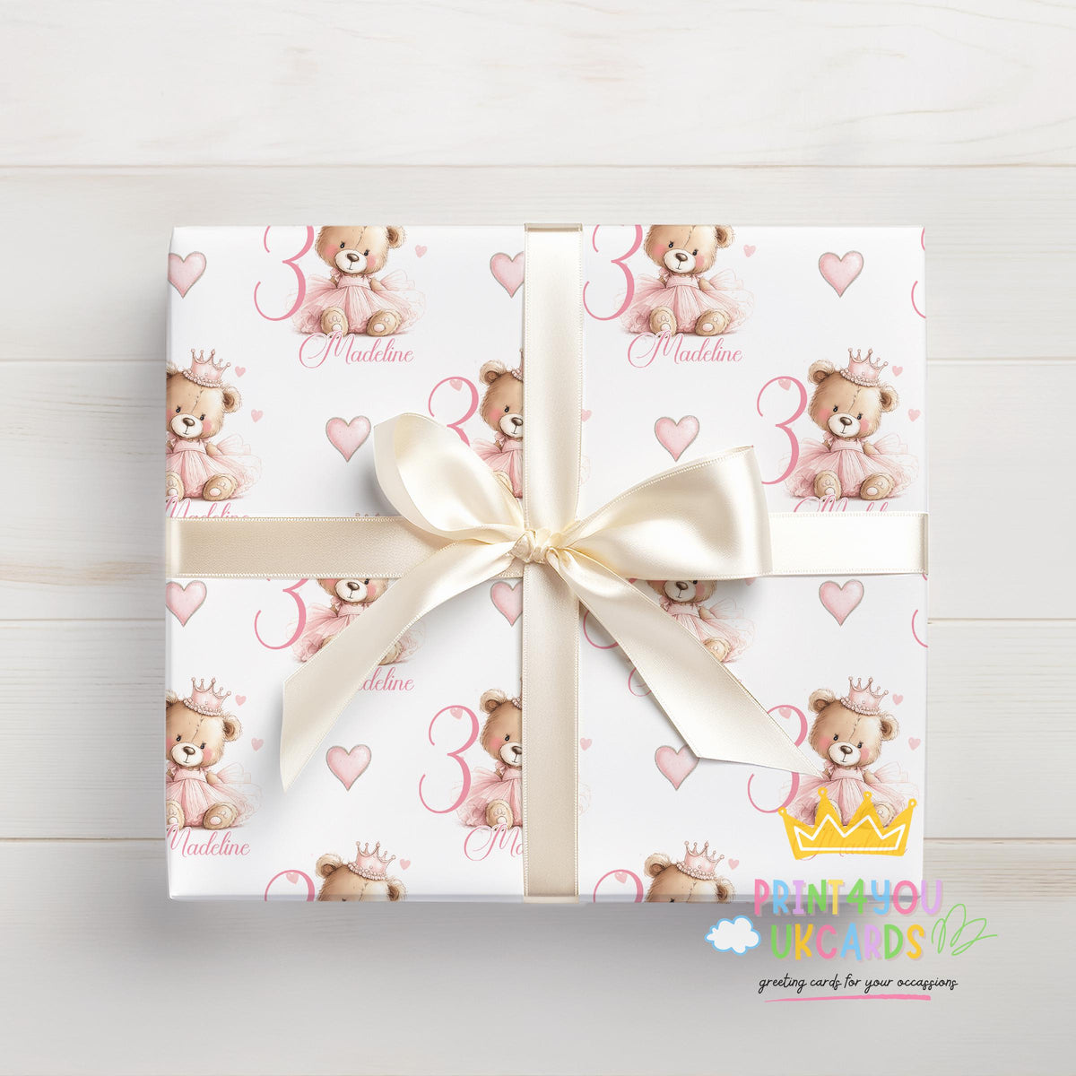 Personalised pink teddy bear wrapping paper rolled and packaged for delivery