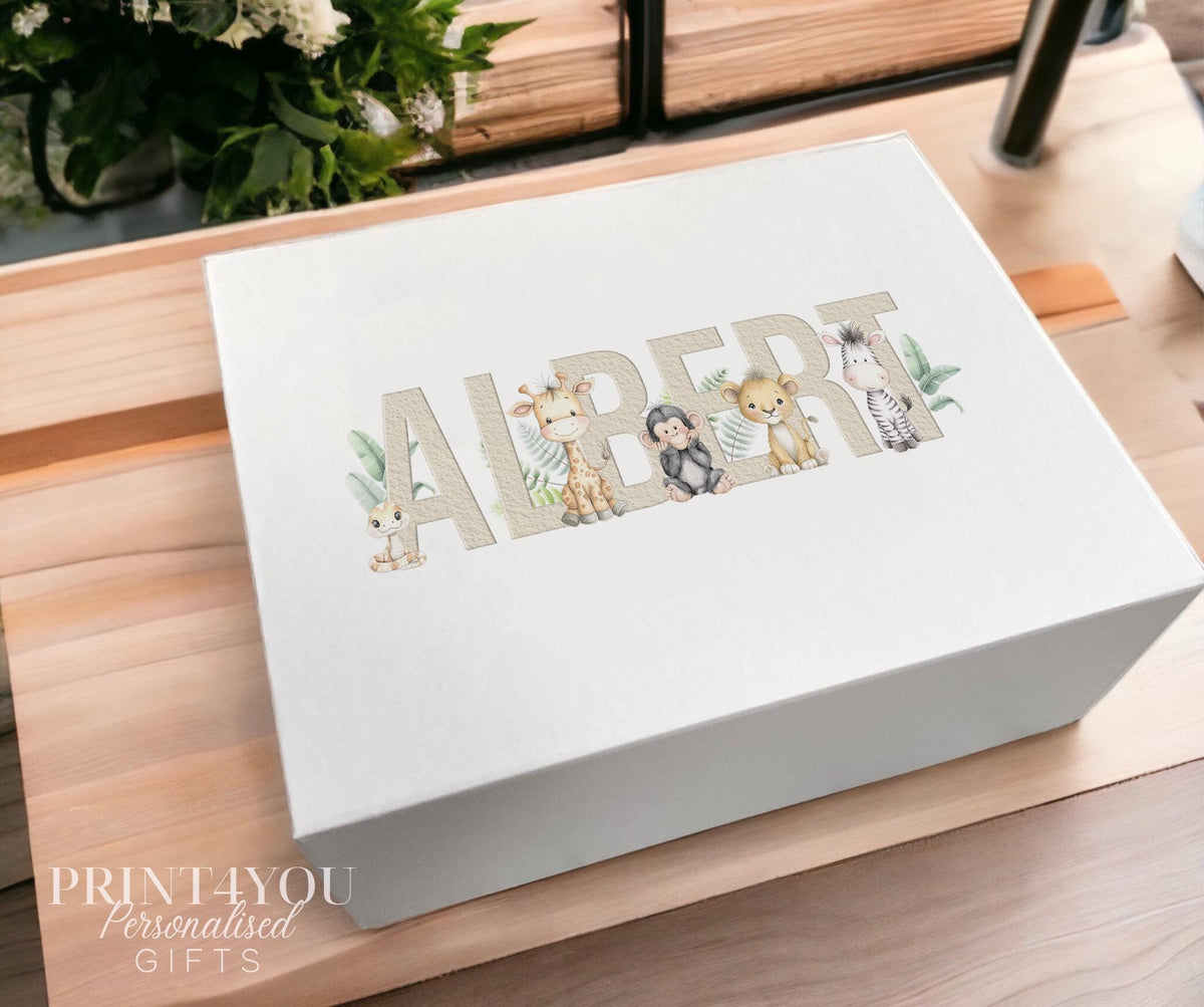 White magnetic keepsake box personalised with a child's name in beige block letters, surrounded by jungle safari animals including a giraffe, monkey, lion and zebra