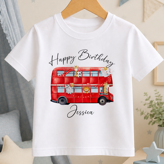 White kids t-shirt with a red London double-decker bus and safari animals design, personalised with a birthday message and name