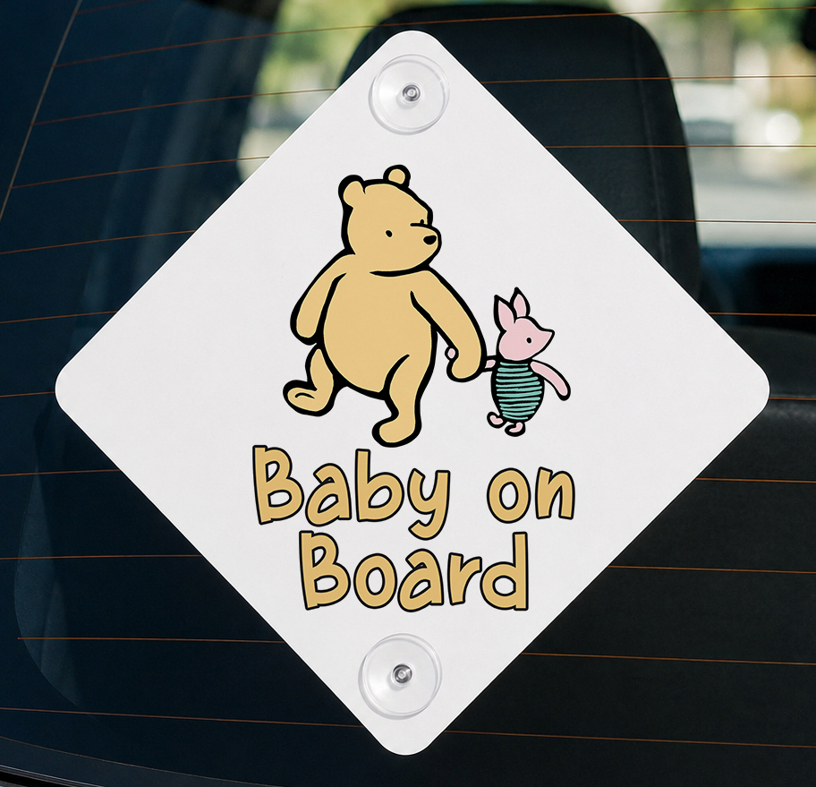 Diamond-shaped baby on board car sign featuring a classic storybook bear and piglet design