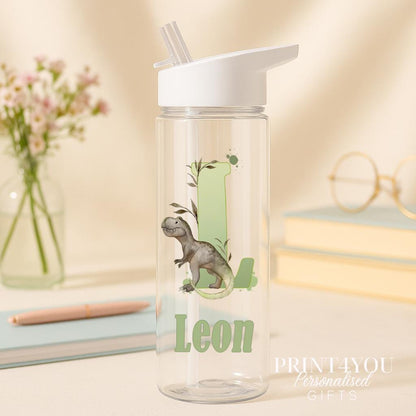 Personalised 750ml dinosaur water bottle with flip straw lid, showing the UV-printed dinosaur design and the child's custom name and initial