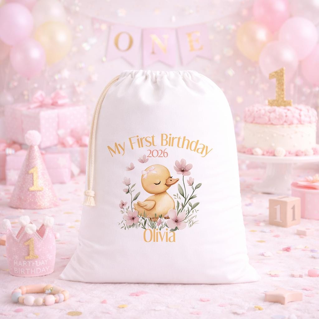White A3 drawstring party bag printed with a pink floral design and personalised child's name for a 1st birthday girl.