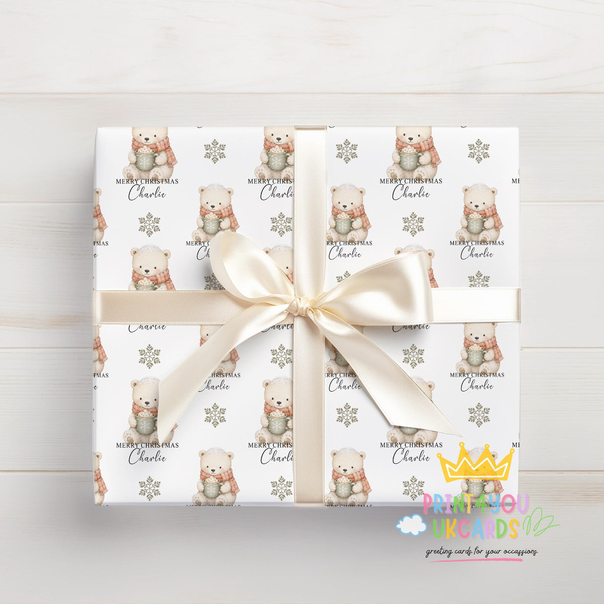 Personalised polar bear Christmas wrapping paper rolled and ready to post in a postal tube