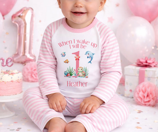 Children's clothing with the 1st birthday pyjamas design