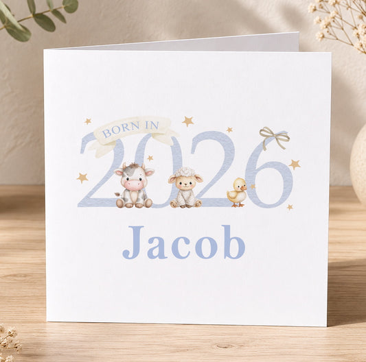 Square newborn greeting card featuring an illustrated cow, sheep and duck with the personalised text 'Born in 2026, Jacob'.