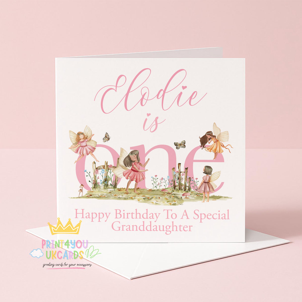Square personalised first birthday card featuring a pink woodland fairy design on a plain background