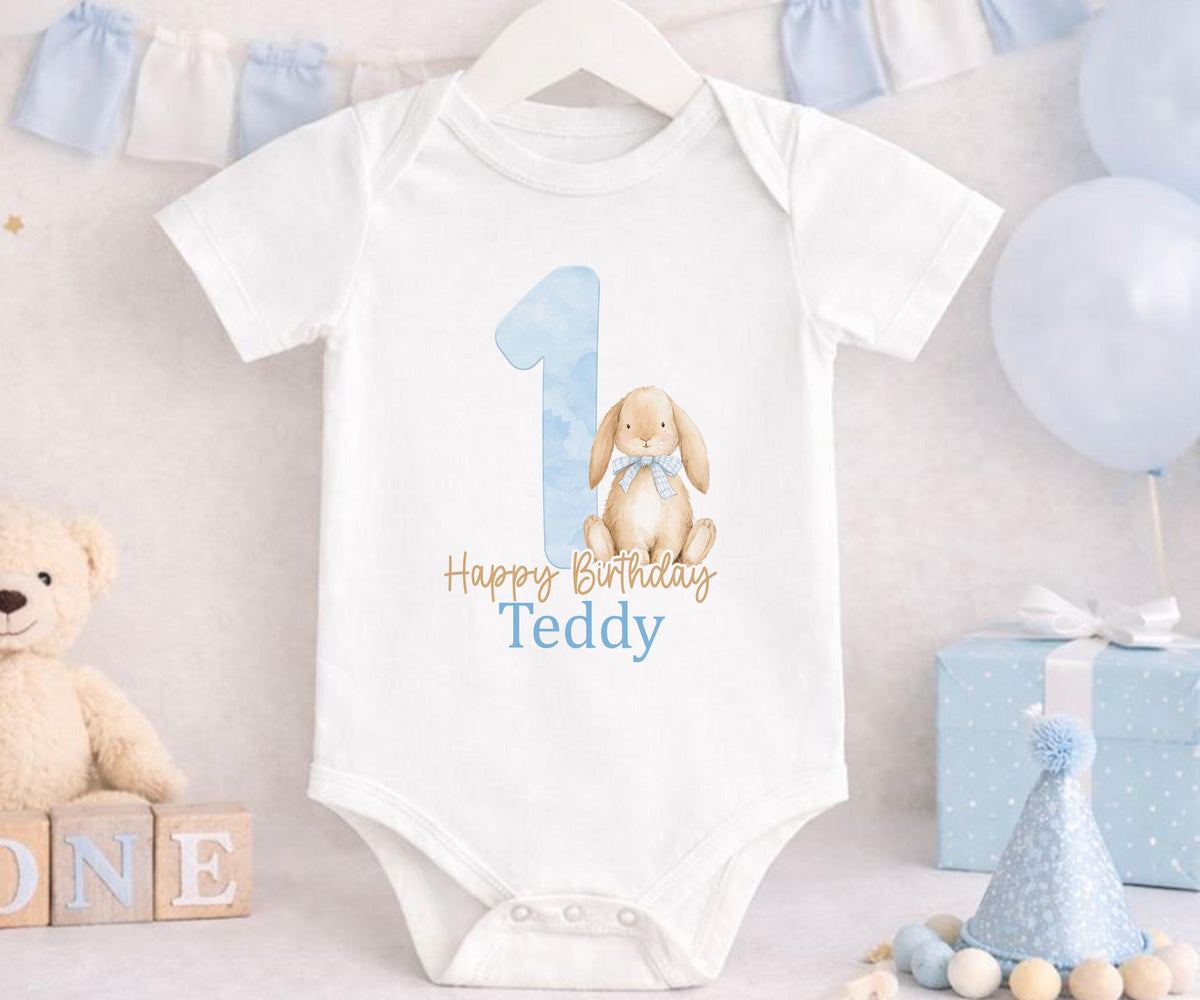 Blue bunny first birthday outfit with number one and custom name printed on soft cotton